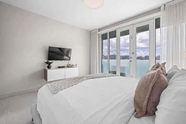 1 bedroom, desk, iron/ironing board, travel crib