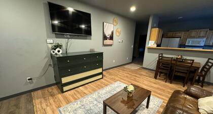 Modern 2-bed with full kitchen, in-unit laundry, and off-street parking. Near downtown Fairbanks.