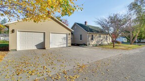 A two-story residential house with a garage and a driveway. - Hike, Boat & Fish: Dog-friendly Robinson Home (Robinson)