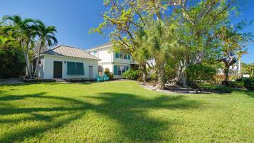Stroll through the well-manicured lawn and enter through the inviting porch area.