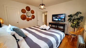 2 habitaciones, tabla de planchar con plancha, cuna de viaje y wifi