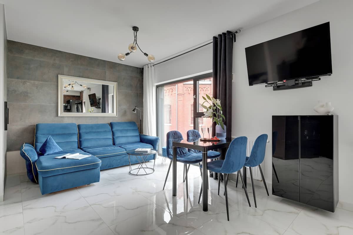 Comfort Apartment, 1 Bedroom | Living area | 50-inch plasma TV with cable channels, Netflix, streaming services