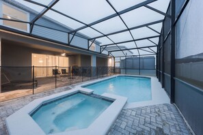 Outdoor pool, a heated pool - Luxury 10 Bed w/Pool, Home Theater, & Gameroom! (Davenport)