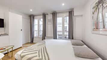 1 habitación, tabla de planchar con plancha, wifi gratis y ropa de cama