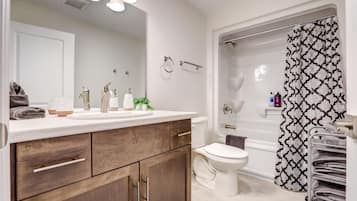 Hair dryer, towels, soap, shampoo