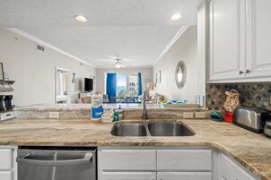 Condo, Ocean View | Private kitchen | Coffee/tea maker, full-size fridge, microwave, oven