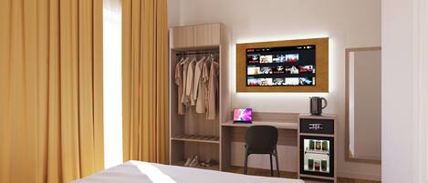 Habitación básica con 1 cama matrimonial o 2 individuales | Caja de seguridad en la habitación y escritorio