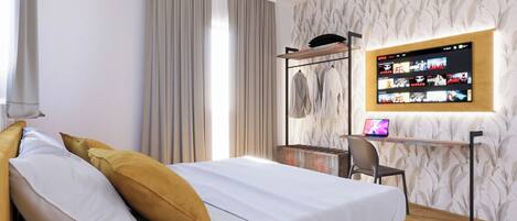 Basic Double or Twin Room | In-room safe, desk, laptop workspace, blackout curtains