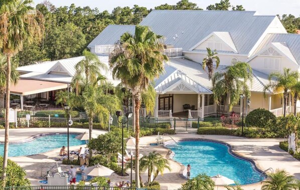 Pool - Charming 2-bedroom hotel suites fitness room in Orlando. 10 miles from Disney! (Orlando)