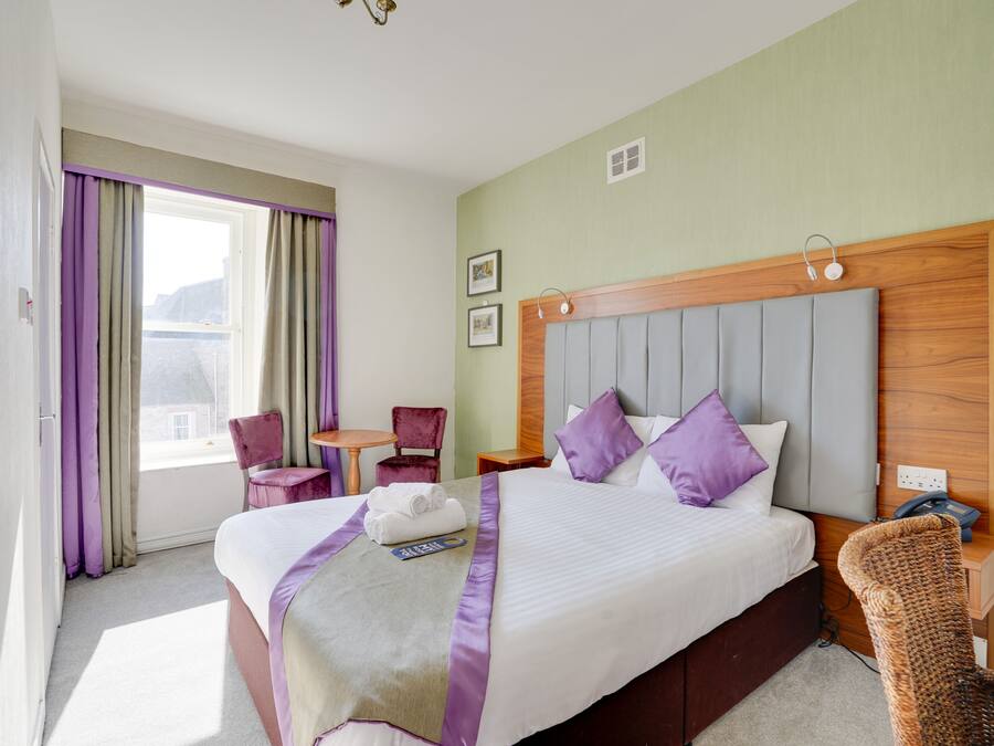 Laptop workspace, iron/ironing board, free WiFi, bed sheets