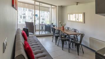 Apartment, City View | Living area | Computer monitors