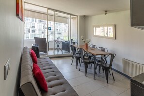 Apartment, City View | Living area | Computer monitors