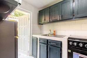 Apartment, Pool View | Private kitchen