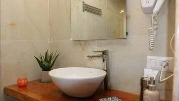 Hair dryer, towels, soap, shampoo