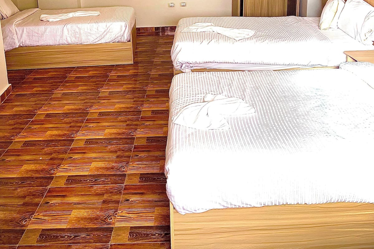 Deluxe Quadruple Room, 4 Bedrooms | Premium bedding, free WiFi