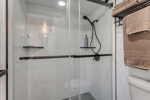 Shower, hair dryer, towels, soap