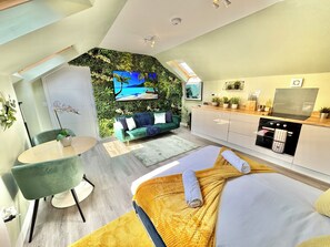 1 dormitorio, tabla de planchar con plancha, wifi gratis y ropa de cama