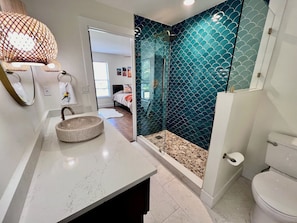 Shower, hair dryer, towels, soap