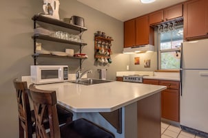 Condo, 1 Bedroom | Private kitchen | Fridge, oven, stovetop, coffee/tea maker