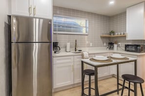 Fridge, microwave, coffee/tea maker, toaster