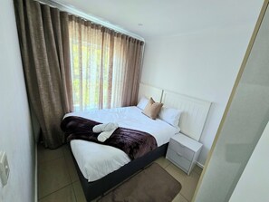 Apartamento, 3 quartos, para não fumantes, varanda | 3 quartos, ferros/tábuas de passar roupa, Wi-Fi de cortesia