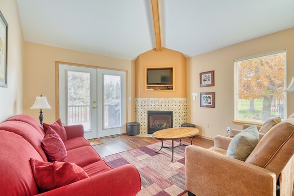 Great room with cozy couch and recliners after a day of Golf