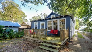 A small blue house with a wooden deck and a red bench. - 4 Mi to Dtwn: Baton Rouge Bungalow w/ Private Yard (Baton Rouge)