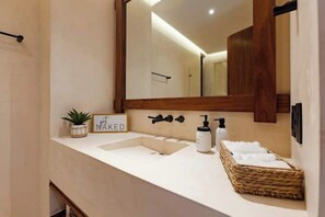 Hair dryer, towels, soap, toilet paper