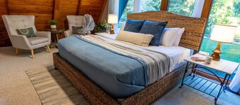 Cozy lakefront A‑frame w/ hot tub & dock
