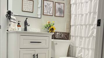 Hair dryer, towels, soap, shampoo