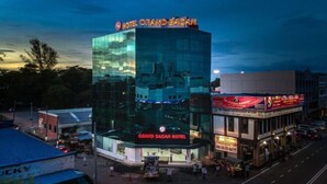 The Grand Bagan Hotel with a modern glass facade and signage. - Grand Bagan Hotel (Butterworth)