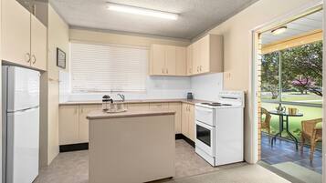 Fridge, microwave, oven, cookware/dishes/utensils