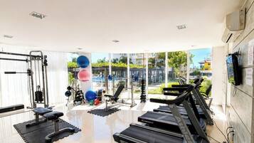 Apartamento lua de mel, acesso à piscina, vista para a praia | Sala de fitness