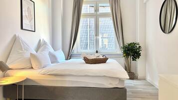 2 bedrooms, travel crib, free WiFi, bed sheets