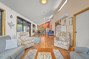 Basic House | Living area | 50-inch Smart TV with digital channels, Netflix, Hulu