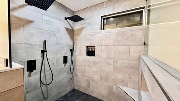 Shower, hair dryer, towels, soap