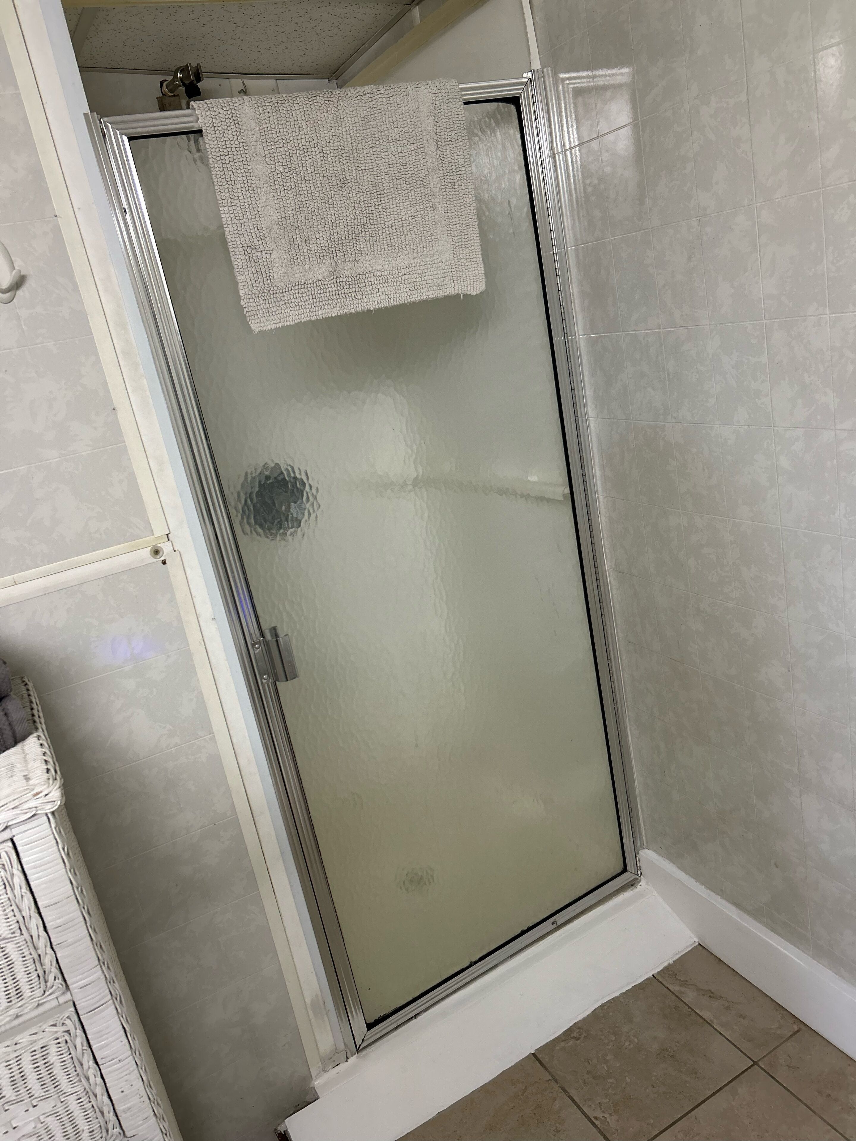 Shower, towels, soap, toilet paper