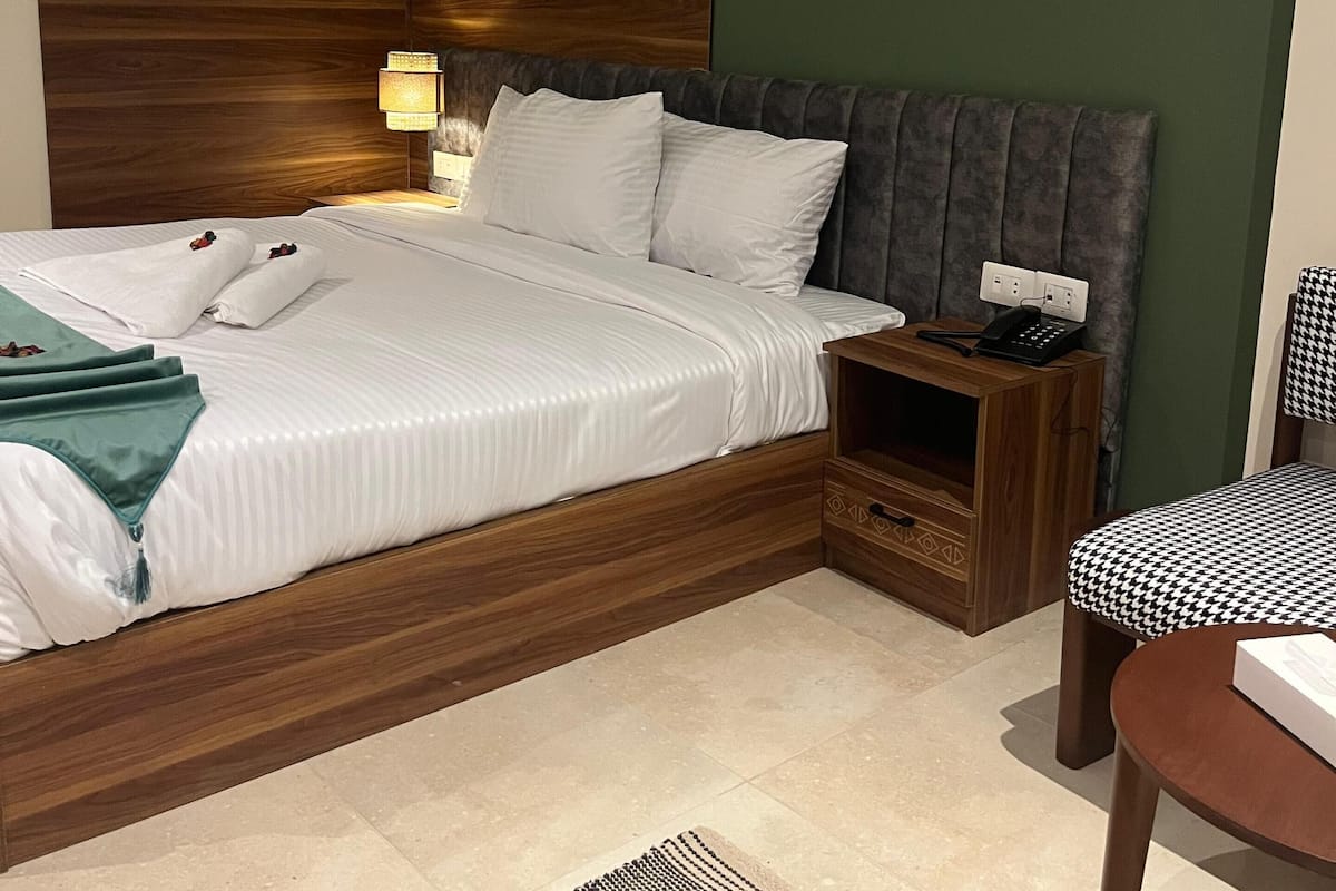 Standard Double Room, City View | In-room safe, soundproofing, iron/ironing board, free cots/infant beds