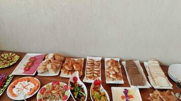 Daily buffet breakfast (USD 10 per person)