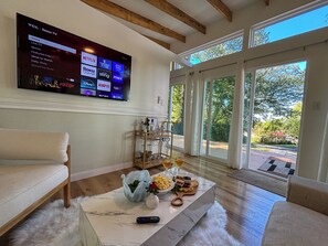 Smart TV, fireplace, books