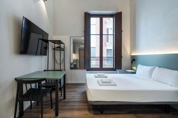 Iron/ironing board, travel crib, free WiFi, bed sheets