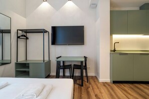 Iron/ironing board, travel crib, free WiFi, bed sheets