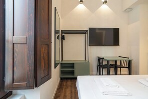 Iron/ironing board, travel crib, free WiFi, bed sheets