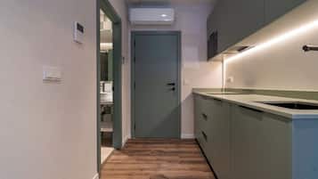 Fridge, microwave, stovetop, coffee/tea maker