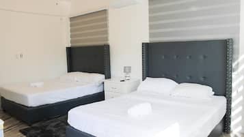 Luxe kamer, 1 twee- of 2 eenpersoonsbedden | Een kluis op de kamer, verduisterende gordijnen, geluiddichte muren