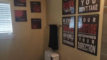 Shower, hair dryer, towels, toilet paper