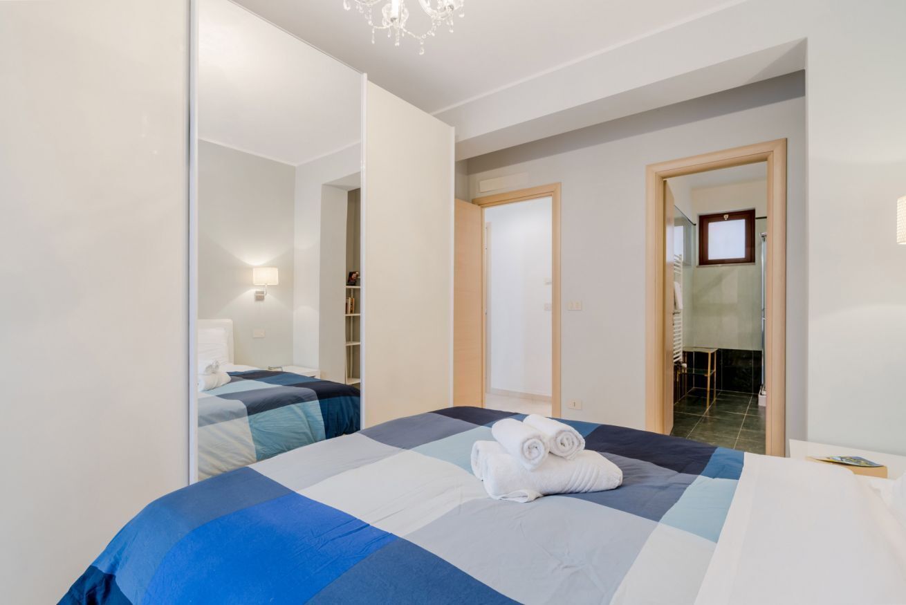 2 slaapkamers, een strijkplank/strijkijzer, beddengoed