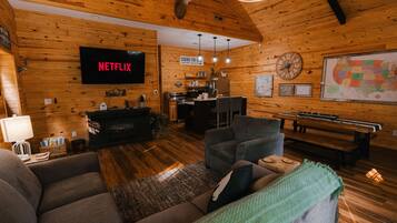 Smart TV, fireplace, books