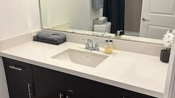 Hair dryer, towels, soap, toilet paper