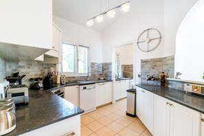 Oven, dishwasher, dining tables